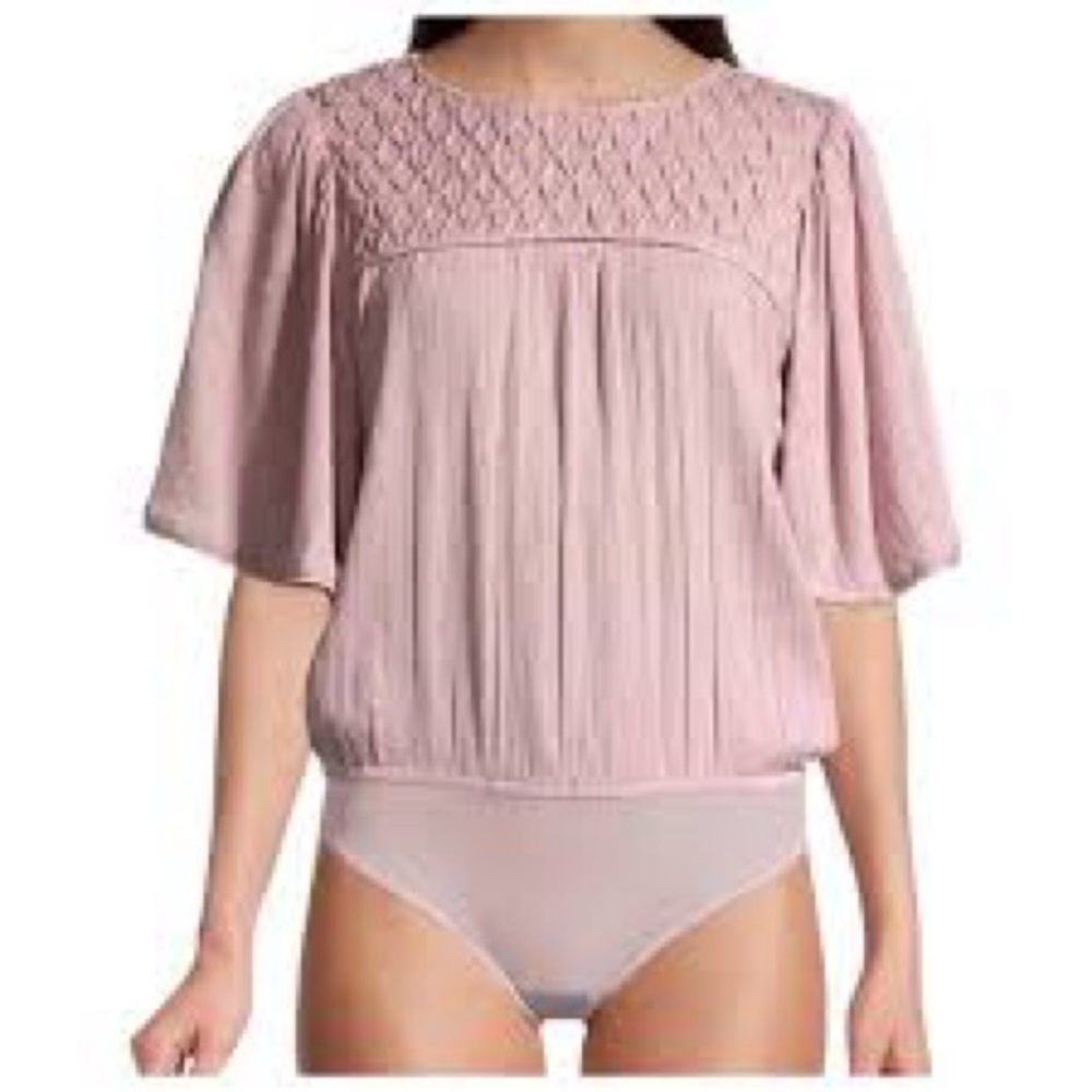 Free People Perfect Catch Bodysuit in dusty pink.